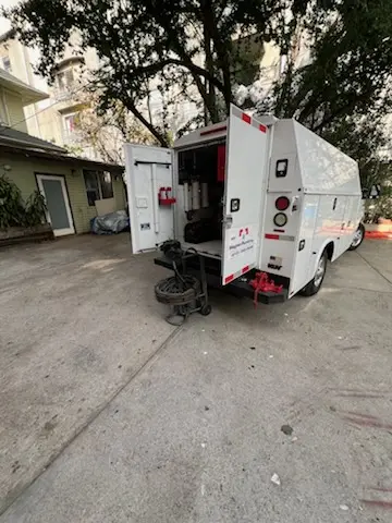 Magnet Plumbing service vehicle on-site for Grease Trap Cleaning in Indialantic by The Sea